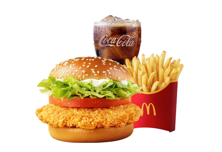 赤いチキンのパティにレタスとトマトをはさんだバーガーのセット