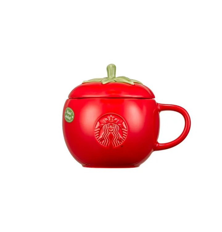 赤いトマトの形をした、ふたつきのマグカップ