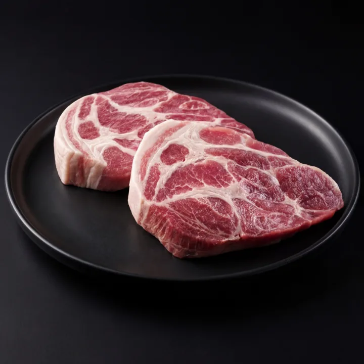 厚切りの豚肩ロース二枚