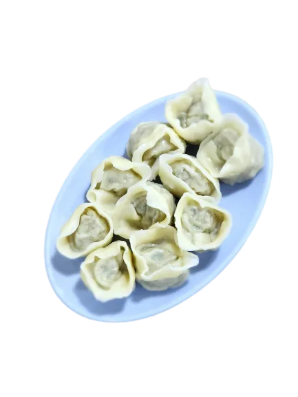 青い皿に並ぶ蒸し餃子