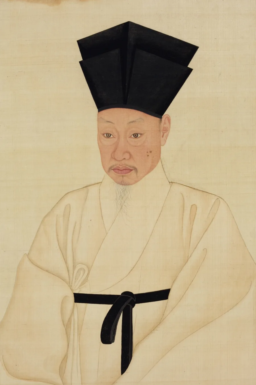 黒い帽子と白衣の人物画