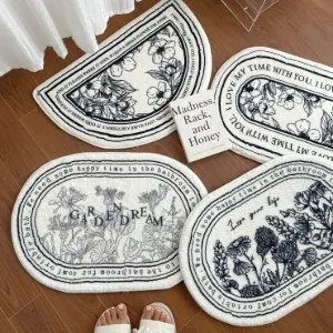 PAPER GARDEN 聖水店 — 床に並べた四枚の花柄マット