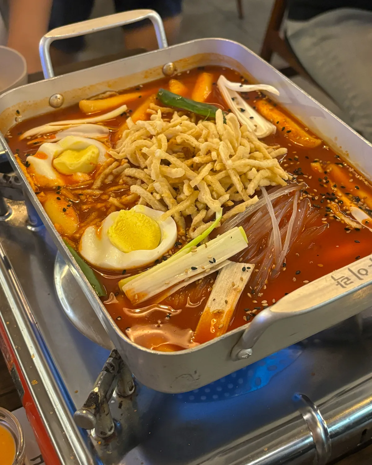 雨耳楽 望遠本店 — 春雨と卵入りスープトッポッキ
